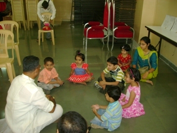 Chatting and playing with the children